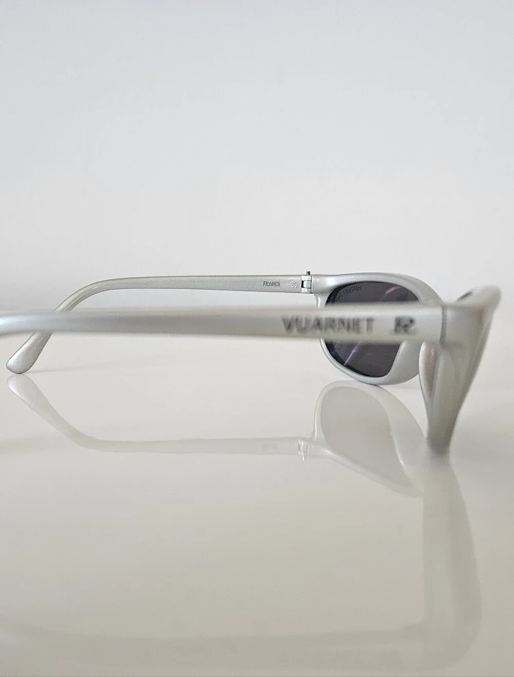 Vuarnet Silver Oval Sunglasses with Dark Lenses